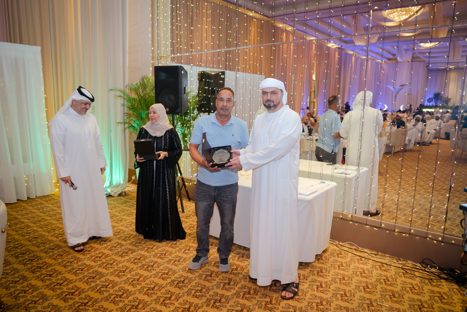 Team member receiving recognition 2025